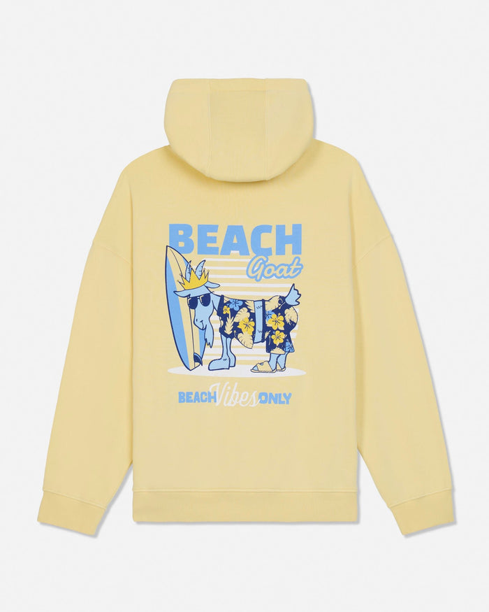 Yellow hoodie with a graphic of a goat, surfboard, and text on the back against a white background