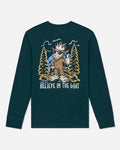 A dark teal long-sleeve t-shirt with a large graphic print on the front featuring a cartoon goat in a forest with the text 'GOAT USA BELIEVE IN THE GOAT'.