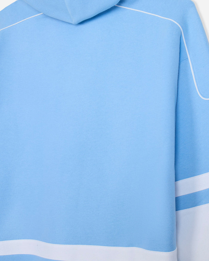 Close-up of back of light blue and white hoodie