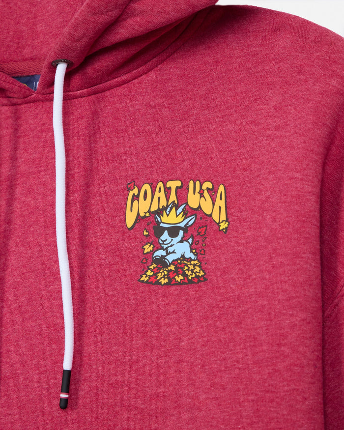 A close-up of a heathered red pullover hoodie featuring a white drawstring and a colorful chest graphic of a blue goat wearing a yellow crown under the text 'GOAT USA'.