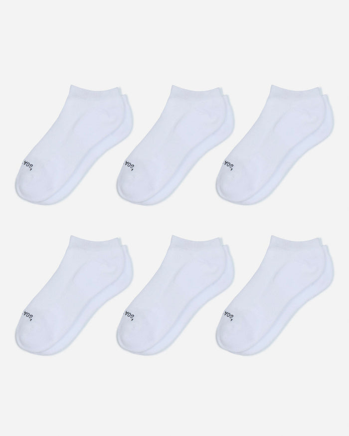 Set of six white ankle socks on a light gray background