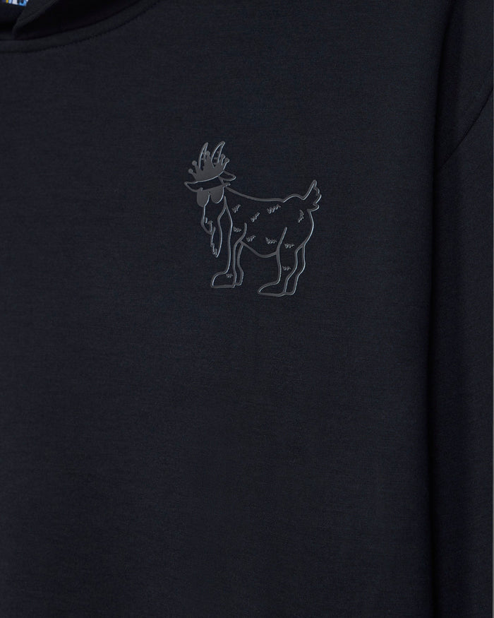 Close-up of outline logo on black hoodie made with athletic material#color_black
