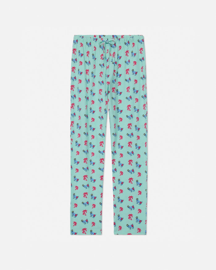 Palm tree-patterned pajama pants on a white background