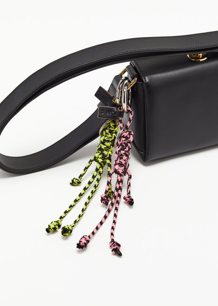 PINK AND BLACK KEY RING WITH HAND WOVEN LANYARD FRINGES