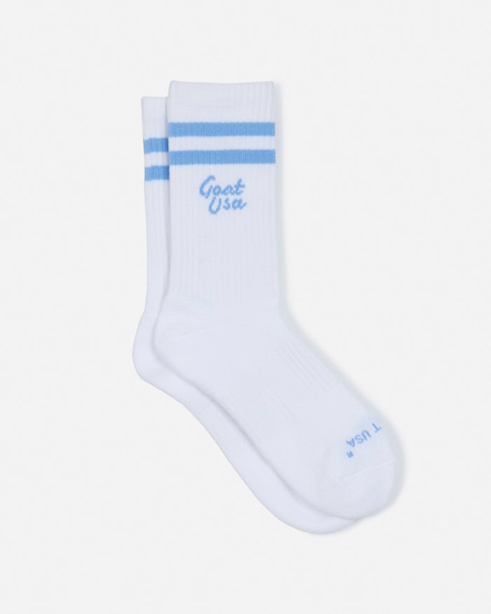 Laid out pair of socks with light blue stripes#color_carolina-blue