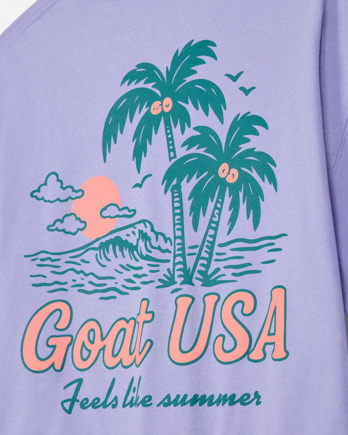 Periwinkle crop tee with 'Goat USA' and beach graphic design